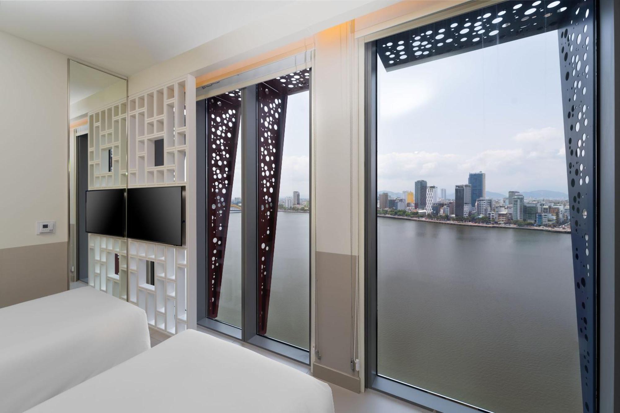 Wink Icon Hotel Danang Riverside - Luxury Suites - 24Hrs Stay & Rooftop Pool Bar Da Nang Quarto foto